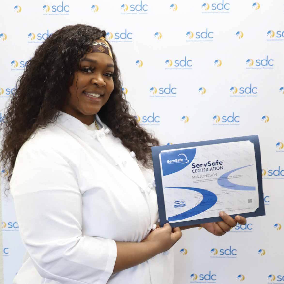 Woman smiling with certification